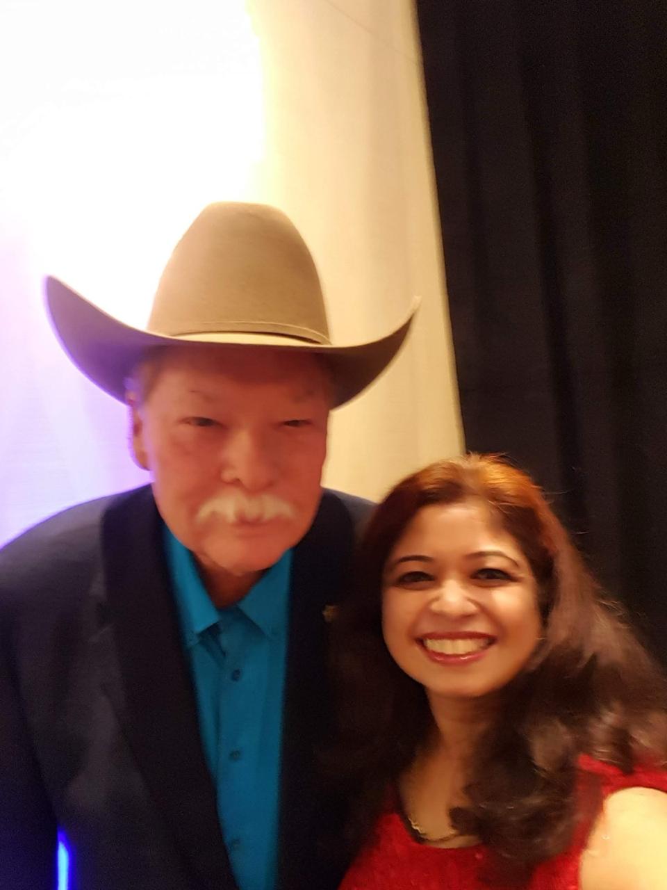 Geetha Krishnan with a fellow guest at a speaking event