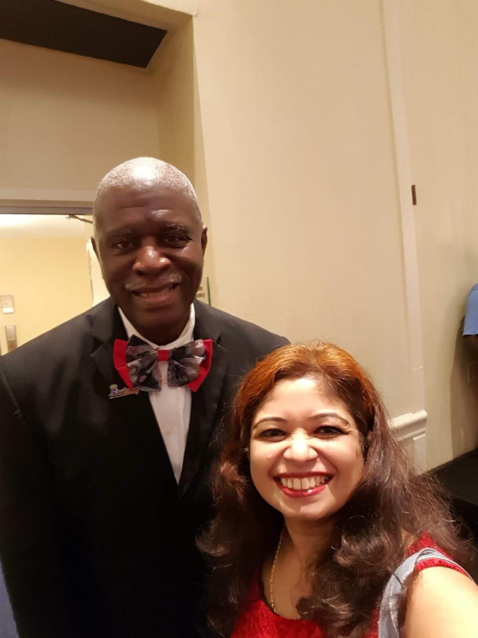 Geetha Krishnan with a fellow guest at a formal event