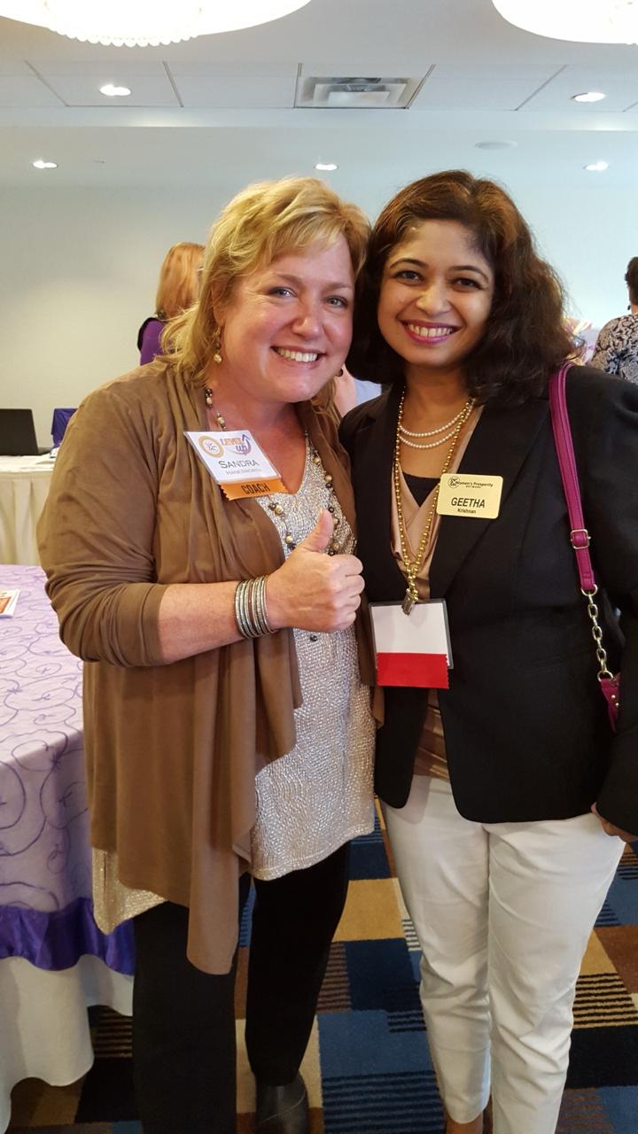 Geetha Krishnan with a fellow coach at a leadership event